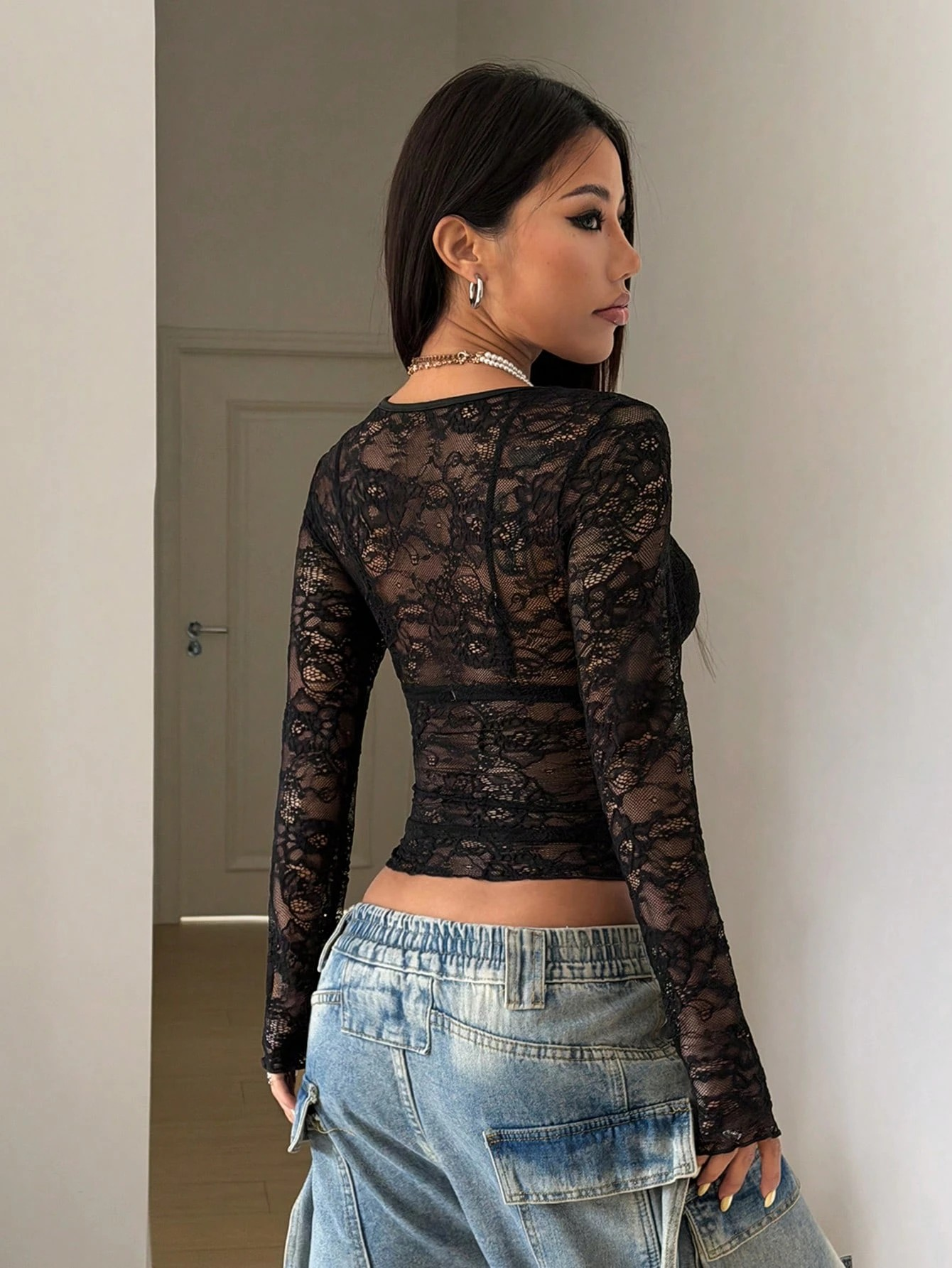 Blouse longue à col rond en dentelle transparente noire pour femmes