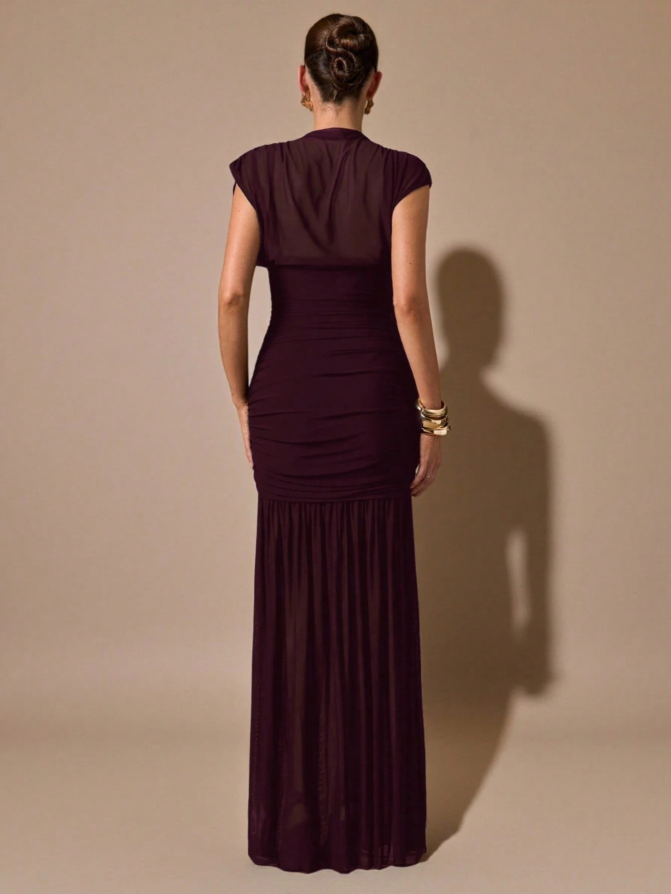 Robe noire enveloppante transparente drapée